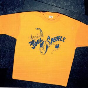 A yellow shirt with the words " soul of people ".