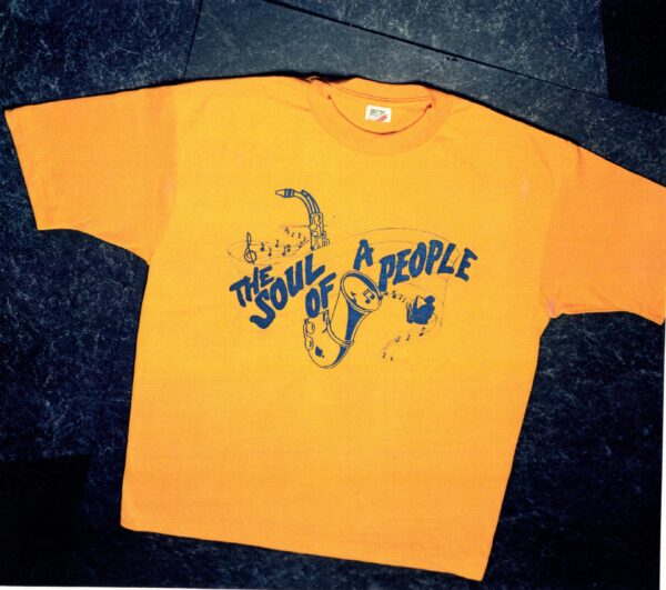 A yellow shirt with the words " soul of people ".